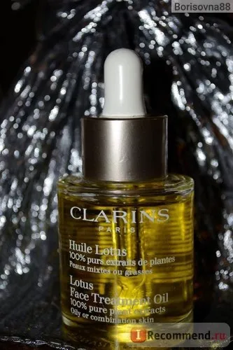 Масло косметичне clarins huile lotus face treatment oil для особи лотос для комбінованої або (масло) Масло косметичне clarins huile lotus face treatment oil для особи лотос для комбінованої або