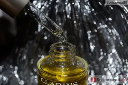 Масло косметичне clarins huile lotus face treatment oil для особи лотос для комбінованої або (лотос) Масло косметичне clarins huile lotus face treatment oil для особи лотос для комбінованої або