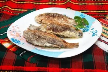 Карасі в сметані
