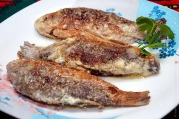 Карасі в сметані