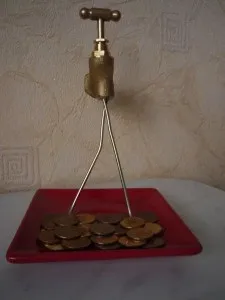 Кран з ллються монетками, сама я