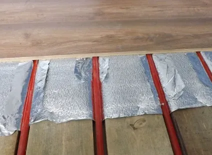 Тепла підлога під ламінат електричний і інфрачервоний, підігрів з водяного опалення, укладання і