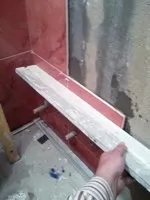 Укладання плитки на стіну по мобільним маяках