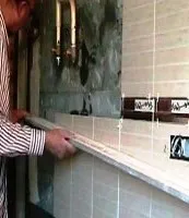 Укладання плитки на стіну по мобільним маяках