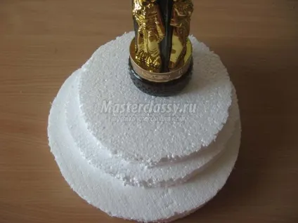 Букет для чоловіка з цукерок і пляшки коньяку (чоловіки) Букет для чоловіка з цукерок і пляшки коньяку