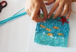 Море і морські мешканці в техніці квіллінг в докладному мк