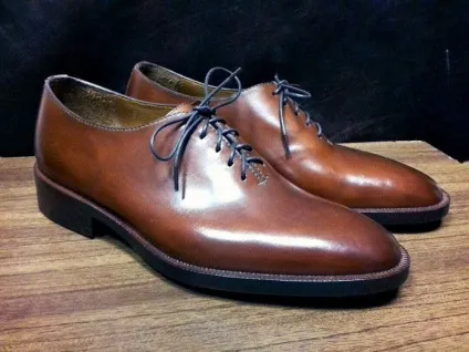 Чоловічі оксфорди - багатолика взуття для елегантних чоловіків (oxford shoes) Чоловічі оксфорди - багатолика взуття для елегантних чоловіків