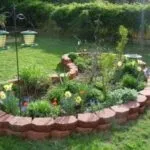Квіткові клумби на дачі своїми руками фото з підручних засобів (дачі) Квіткові клумби на дачі своїми руками фото з підручних засобів