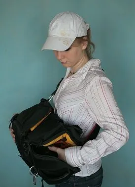 Як тягати фотоапарат