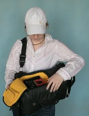 Як тягати фотоапарат