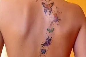 Тату метелик на спині - значення, фото, ескізи (метелик) Тату метелик на спині - значення, фото, ескізи