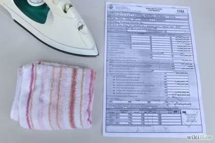 Як розгладити пом'ятий папір