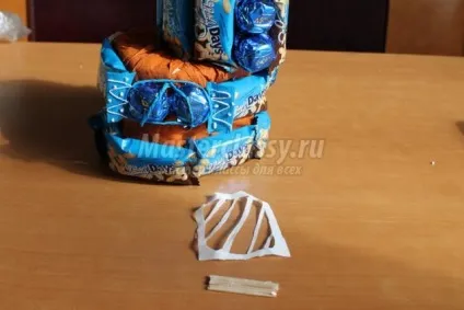 Солодка композиція з цукерок