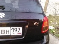 Наклейка на авто кіт Саймона з мискою в лапах машину вінілова - матова, глянцева, (матова) Наклейка на авто кіт Саймона з мискою в лапах машину вінілова - матова, глянцева,