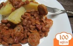 Бюджетна тушкована картопля з курячими шийками - покроковий рецепт з фото