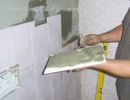 Як обкласти піч плиткою своїми руками мужик в