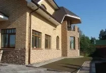Оздоблення фасаду будинку панелями під камінь своїми руками (фото) (фасаду) Оздоблення фасаду будинку панелями під камінь своїми руками (фото)