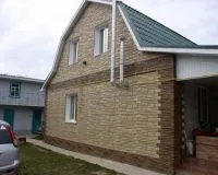 Стінові панелі під камінь