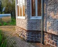 Стінові панелі під камінь