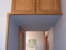 Як зробити антресоль своїми руками, виготовлення кутових антресолей в передпокій над дверима, фото (дверцята для антресолей) Як зробити антресоль своїми руками, виготовлення кутових антресолей в передпокій над дверима, фото