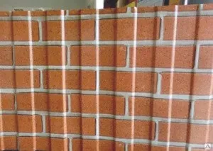 Декоративні види профнастилу з природним покриттям камінь, дерево і цегла