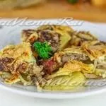 Картопля запечена в духовці з м'ясом, грибами і помідорами, рецепт