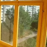 Засклення балконів дерев'яними рамами особливості використання, монтаж своїми руками