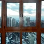 Засклення балконів дерев'яними рамами особливості використання, монтаж своїми руками