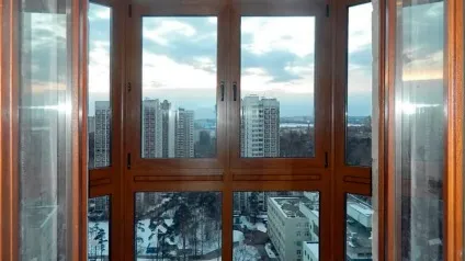 Засклення балконів дерев'яними рамами особливості використання, монтаж своїми руками