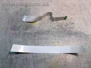 Як зачистити електричний шлейф під час ремонту принтера