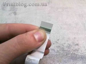 Як зачистити електричний шлейф під час ремонту принтера
