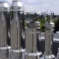 Оздоблення димоходу на даху герметизація покрівлі ізоляційними матеріалами