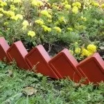 Садовий бордюр (35 фото) особливості пластикових, бетонних, декоративних виробів, каменів, фото і