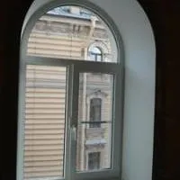 Арочний укіс для пластикового вікна