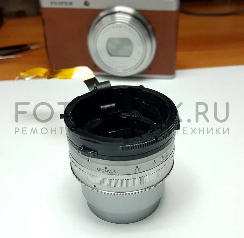 Fujifilm xf1 при включенні видає повідомлення «помилка управління об'єктивом», не працює об'єктив (видає) Fujifilm xf1 при включенні видає повідомлення «помилка управління об'єктивом», не працює об'єктив