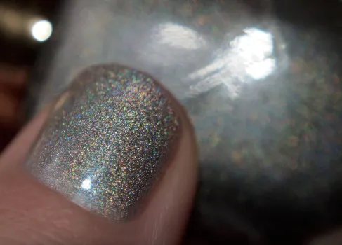 Скромний Голографик - лак для нігтів eveline holographic shine №406, записки лакоголіка (shine) Скромний Голографик - лак для нігтів eveline holographic shine №406, записки лакоголіка