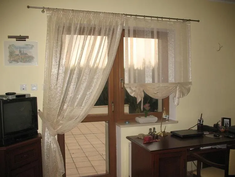 Штори в зал і вітальню на вікно з балконом фото новинок 2017 роки (балконом) Штори в зал і вітальню на вікно з балконом фото новинок 2017 року