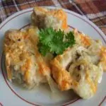 Тушкована курка в молоці