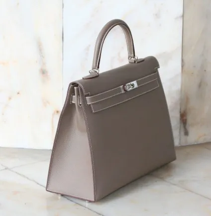 Сумки жіночі hermes birkin, колекції фірми, моделі шкіряні і замшеві (жіночі) Сумки жіночі hermes birkin, колекції фірми, моделі шкіряні і замшеві