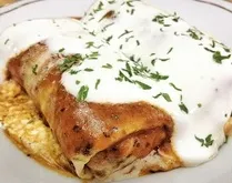 Млинці фаршировані куркою і грибами