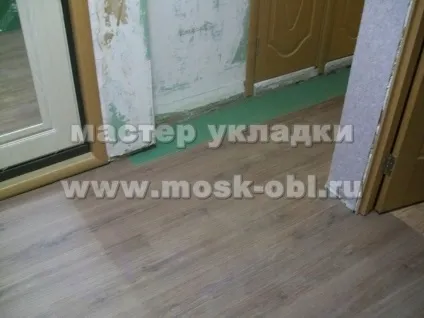 Укладання ламінату в пана образному коридорі (укладання ламінату в коридорі рубльовської шосе) Укладання ламінату в пана образному коридорі
