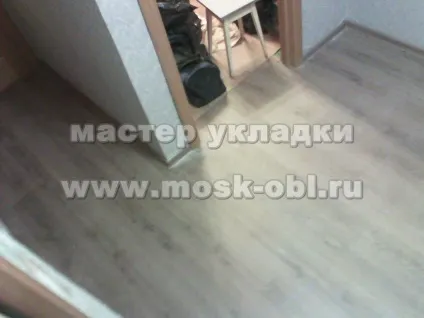 Укладання ламінату в пана образному коридорі (укладання ламінату в пана образному коридорі) Укладання ламінату в пана образному коридорі