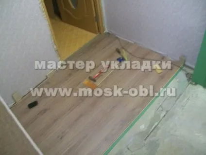 Укладання ламінату в пана образному коридорі (ламінату пана образному коридорі) Укладання ламінату в пана образному коридорі