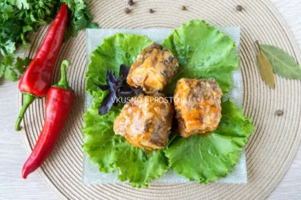 Хек, тушкований з овочами