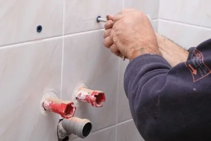 Як підключити раковину підвісну з тумбою своїми руками