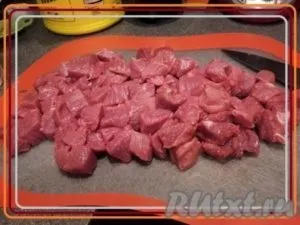 Кролик з картоплею в рукаві - готуємо покроково з фото