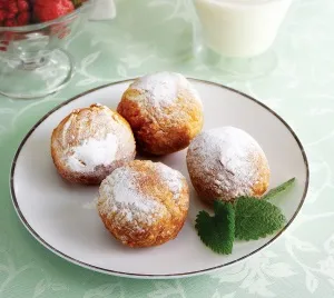 Пончики зі згущеним молоком всередині рецепт з фото 1