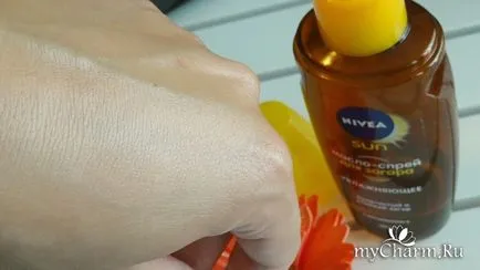 Golden тен на кожата си с NIVEA - NIVEA слънце масло спрей тен