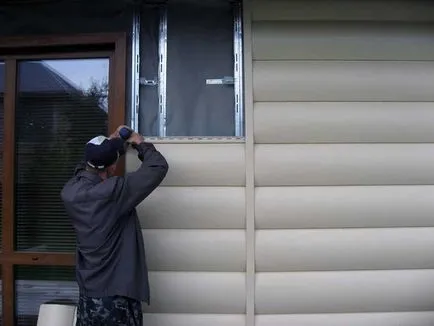 Vinyl Siding alatt egy napló - egy új típusú homlokzati dekoráció