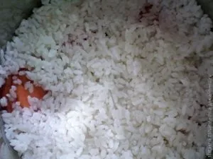 Скумбрія тушкована з рисом